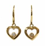 A pair of 18ct gold diamond earrings,