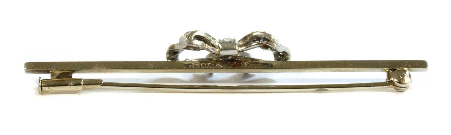 A white gold diamond set bow brooch, c.1925, - Image 2 of 2