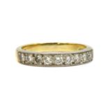 An 18ct gold diamond half eternity ring,