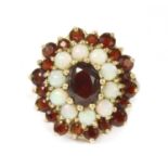 A 9ct gold garnet and opal cluster ring,