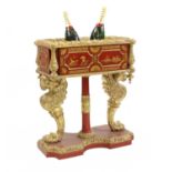 A Regency Revival gilt and red lacquered wine cooler,