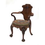 A Queen Anne-style walnut elbow chair,