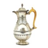 A Victorian silver coffee pot,