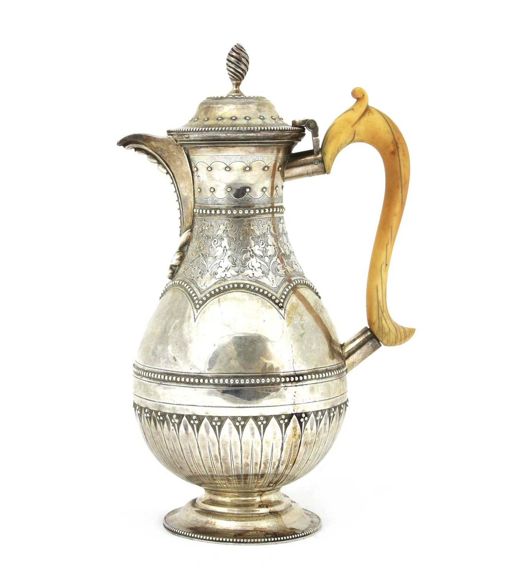 A Victorian silver coffee pot,