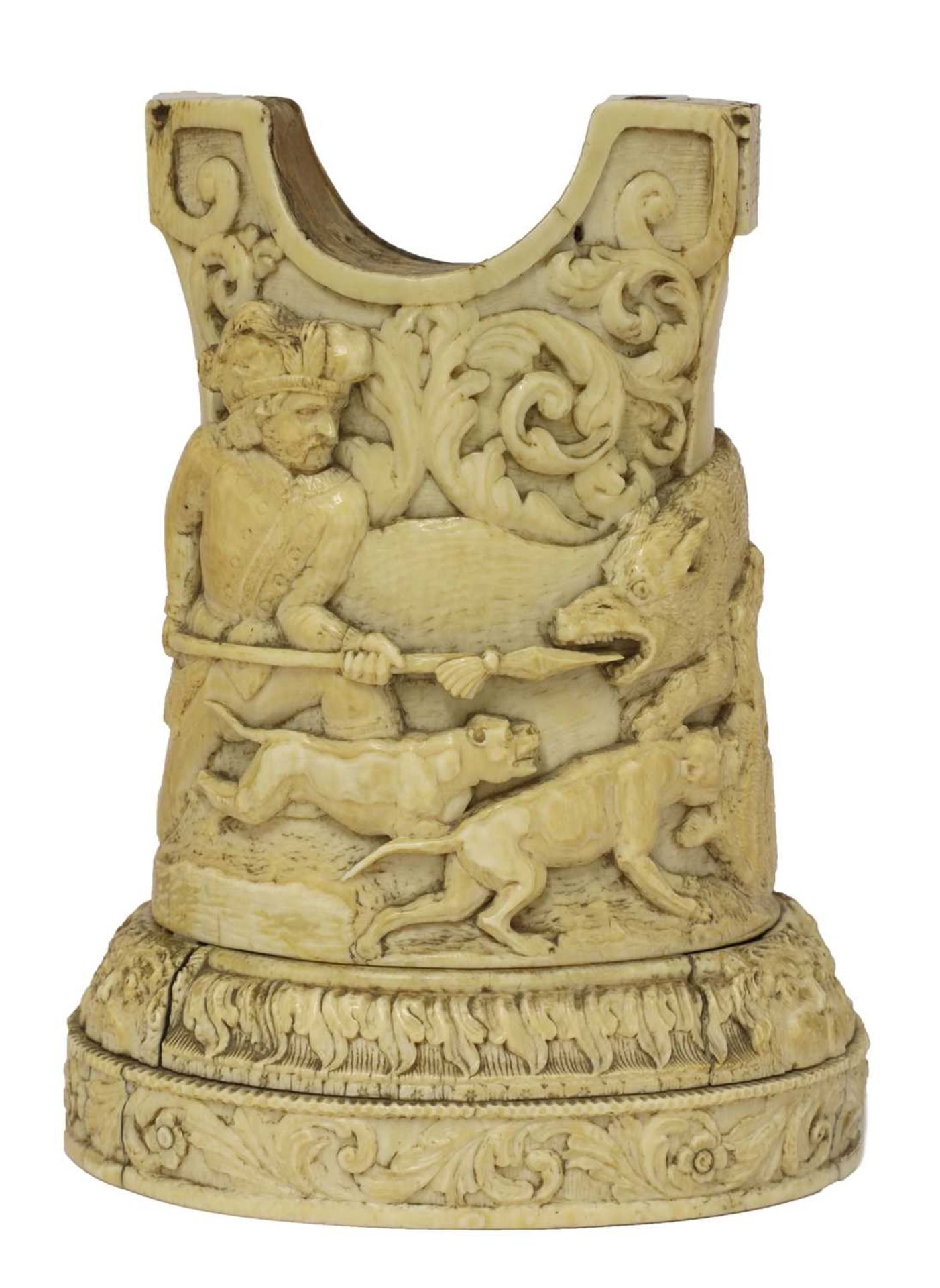 A carved ivory gun rest,