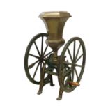 A large coffee grinder by Parnell & Sons,