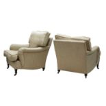 A near pair of easy armchairs