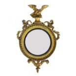 A Regency giltwood convex mirror,