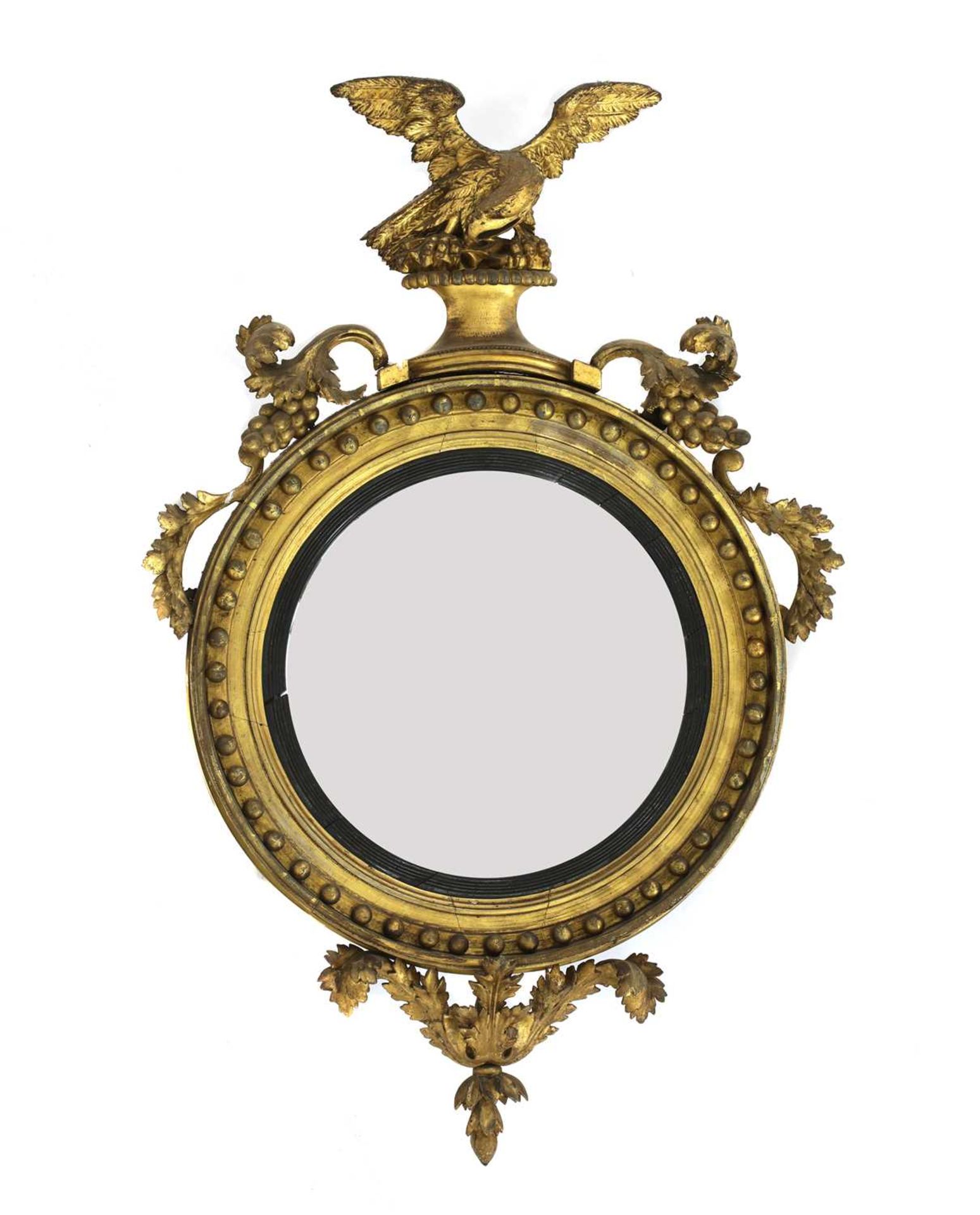 A Regency giltwood convex mirror,