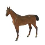 A cold-painted bronze of a bay horse,
