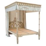 A Gothic Revival painted four-poster bed,