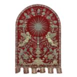 An Italian gilt and silvered metal and red velvet altar hanging,