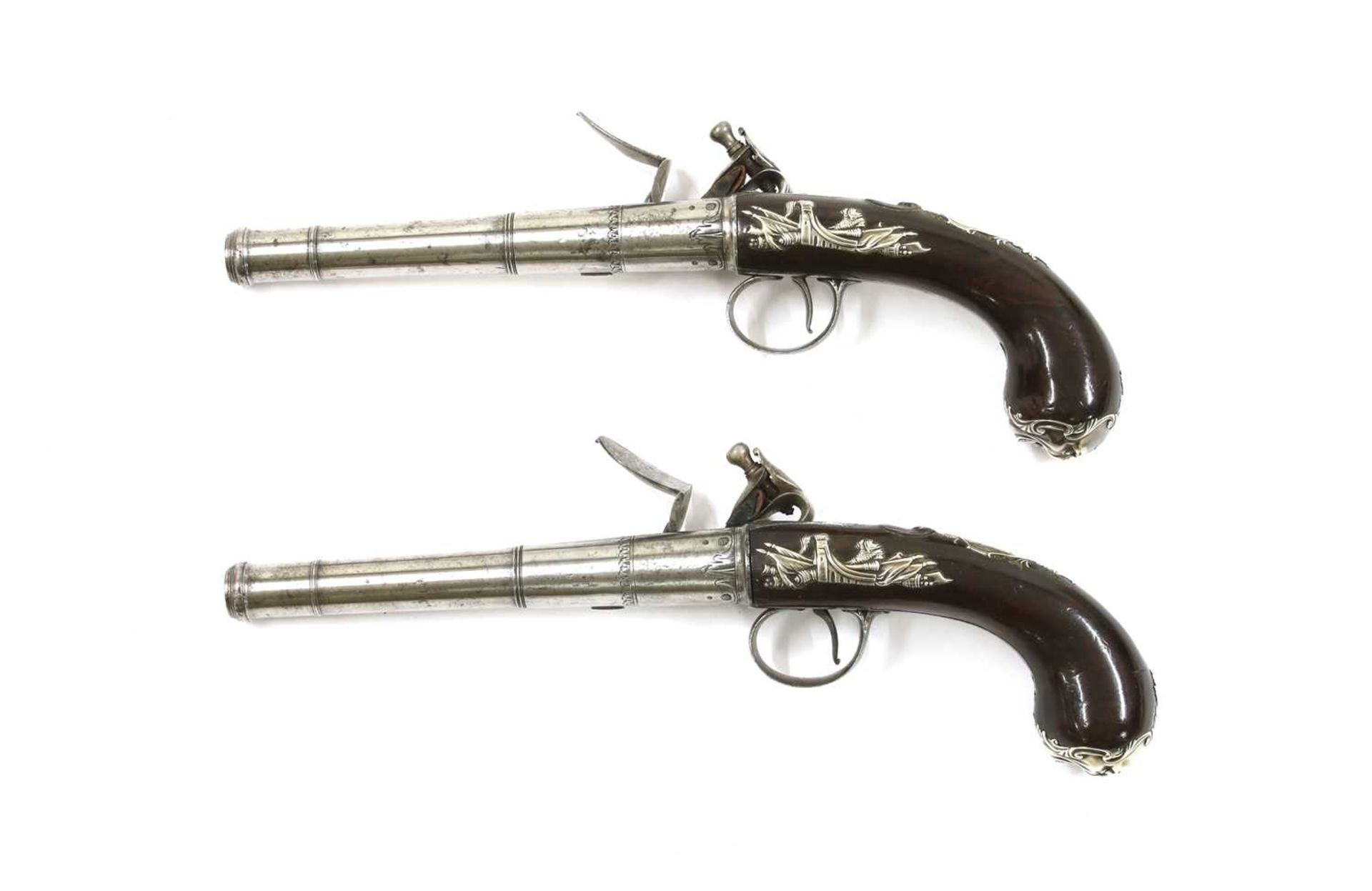 A pair of Queen Anne-style flintlock pistols,