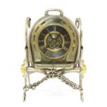 An unusual French silver-plated table clock,