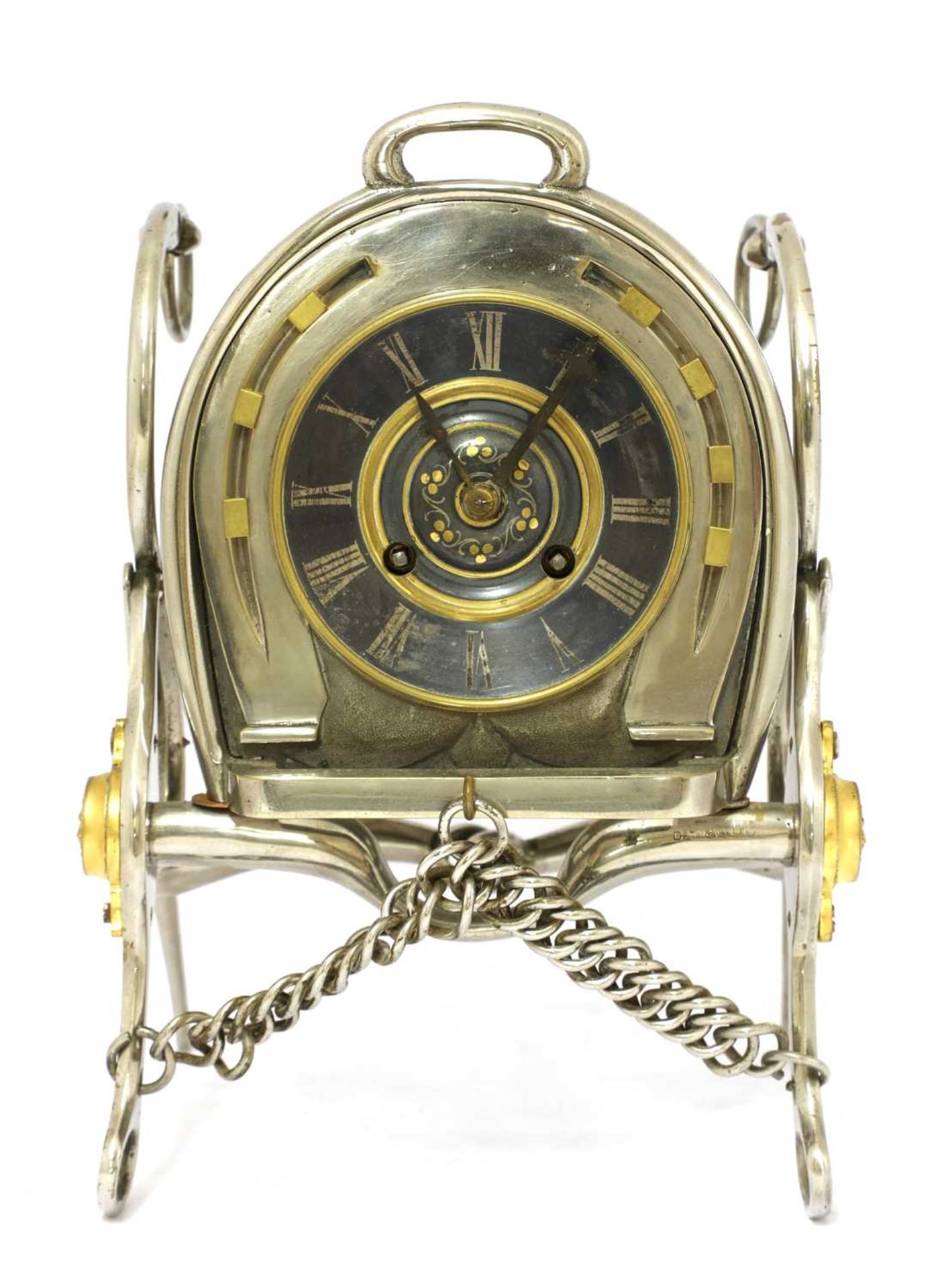 An unusual French silver-plated table clock,