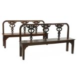 A pair of Italian neoclassical-style walnut hall seats,