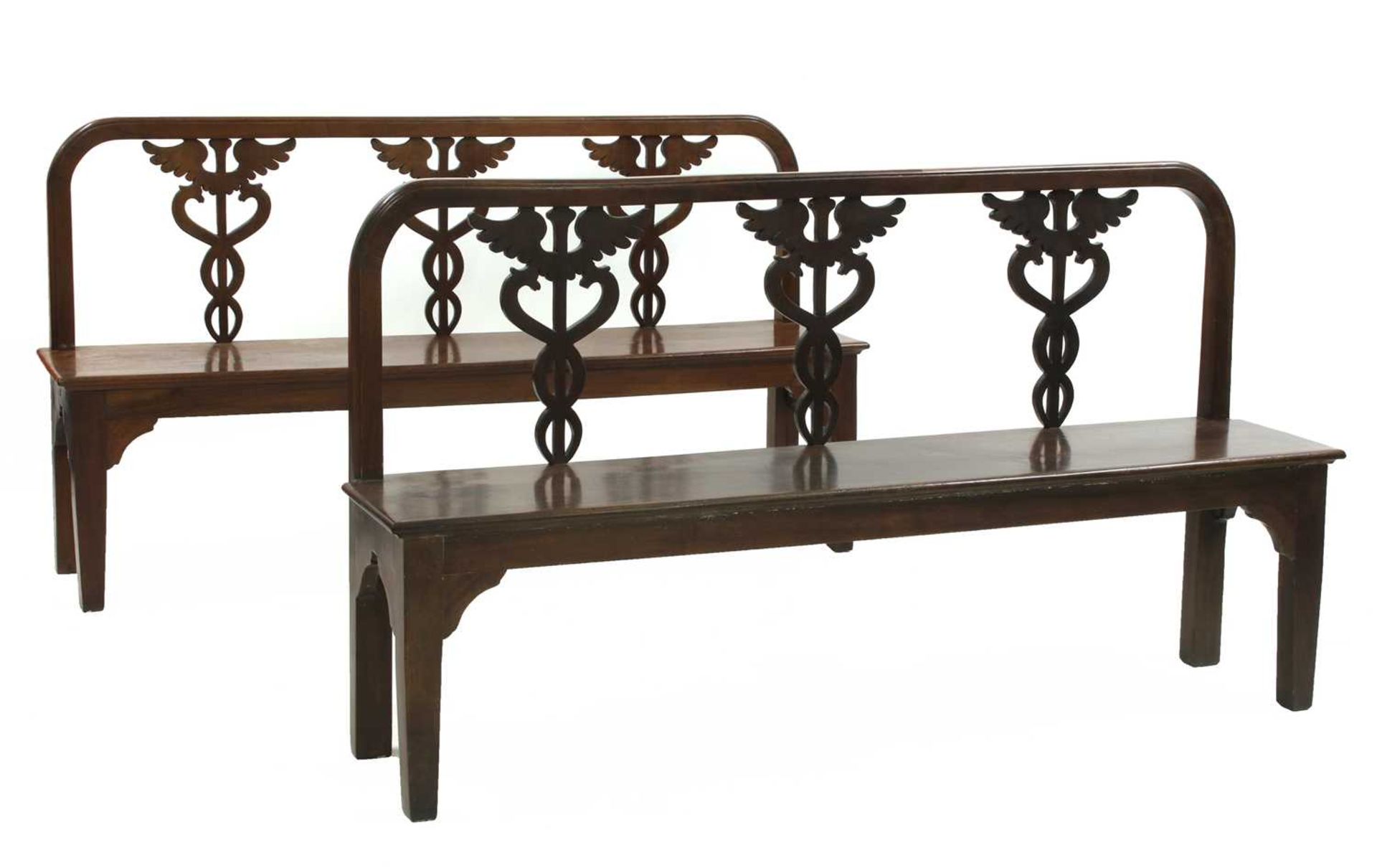 A pair of Italian neoclassical-style walnut hall seats,