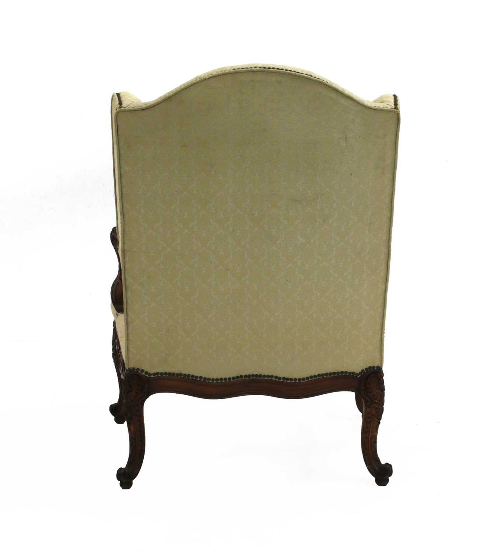 A French Régence walnut wing backed armchair, - Image 4 of 5