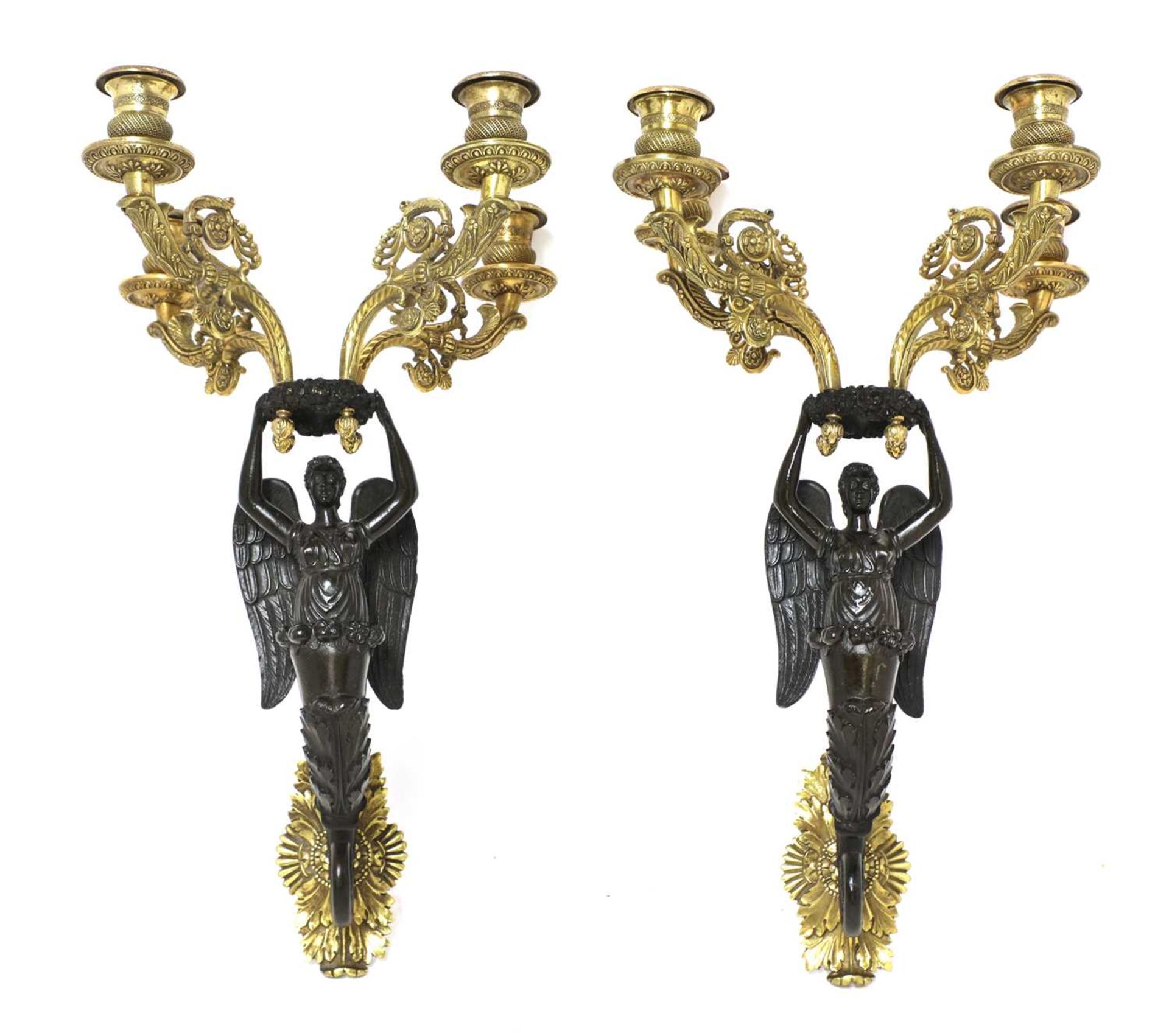 A pair of French bronze and ormolu wall sconces,