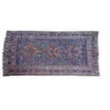 A Persian Khamseh carpet,