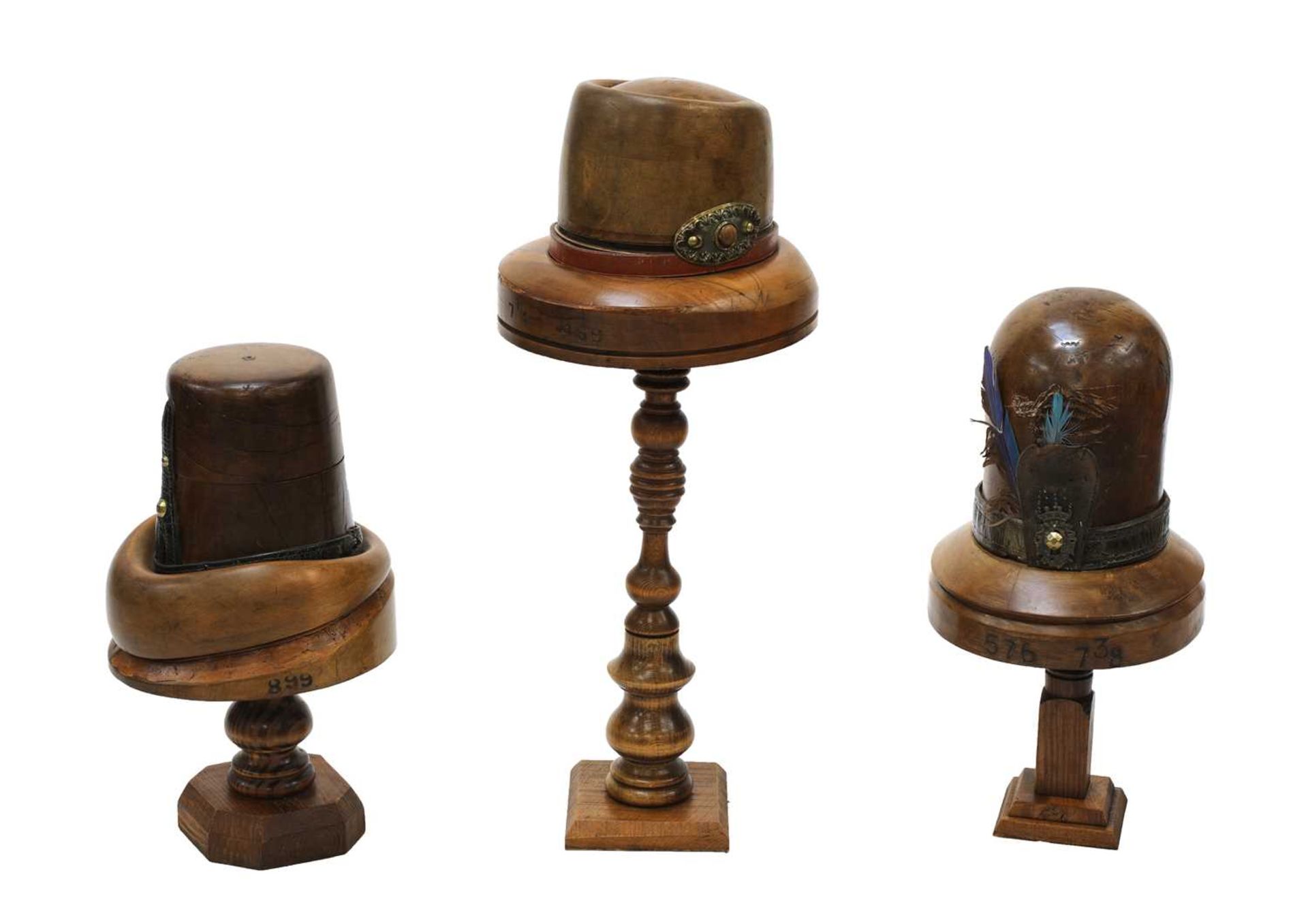 Three Continental treen hat formers,