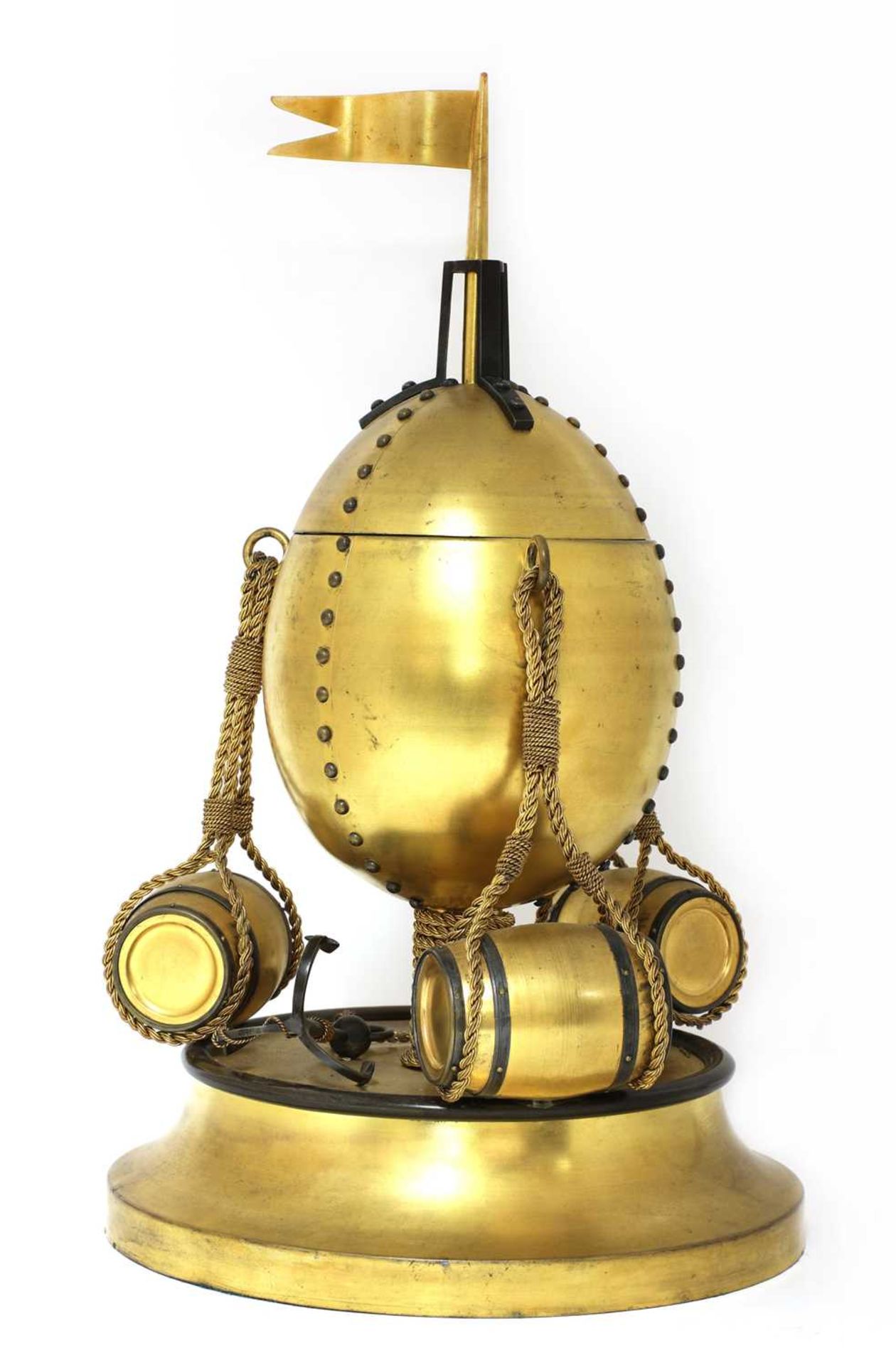 An extraordinary spun and cast brass cigar dispenser in the form of a hot air balloon,