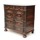 An oak chest of drawers,