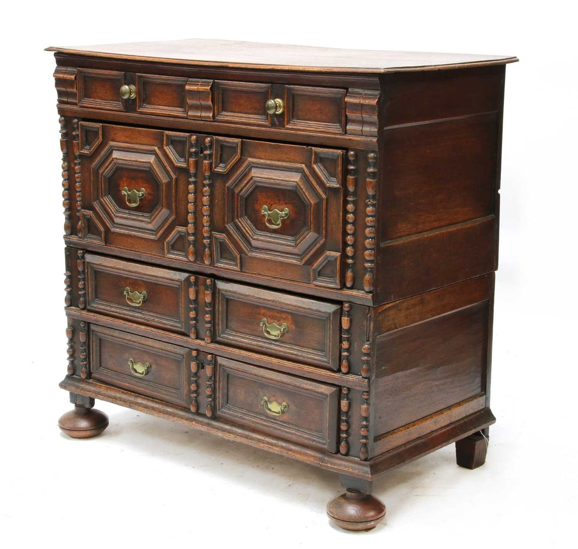 An oak chest of drawers,