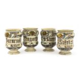 A set of four Italian majolica apothecary jars,