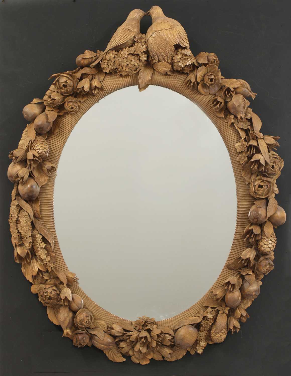 An ornately carved mirror in the style of Grinling Gibbons, - Image 4 of 4