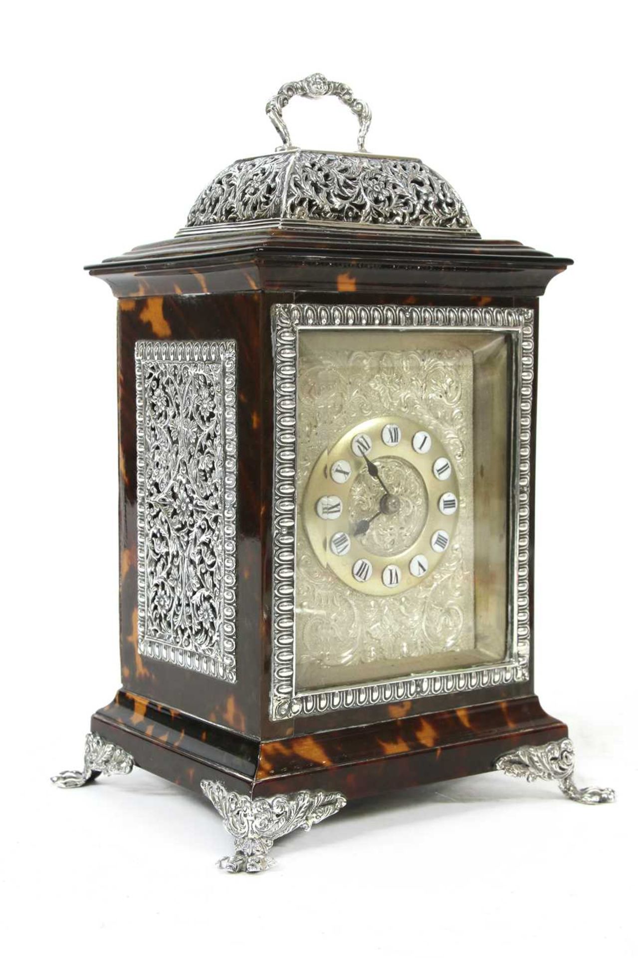 A cast silver and tortoiseshell carriage clock,