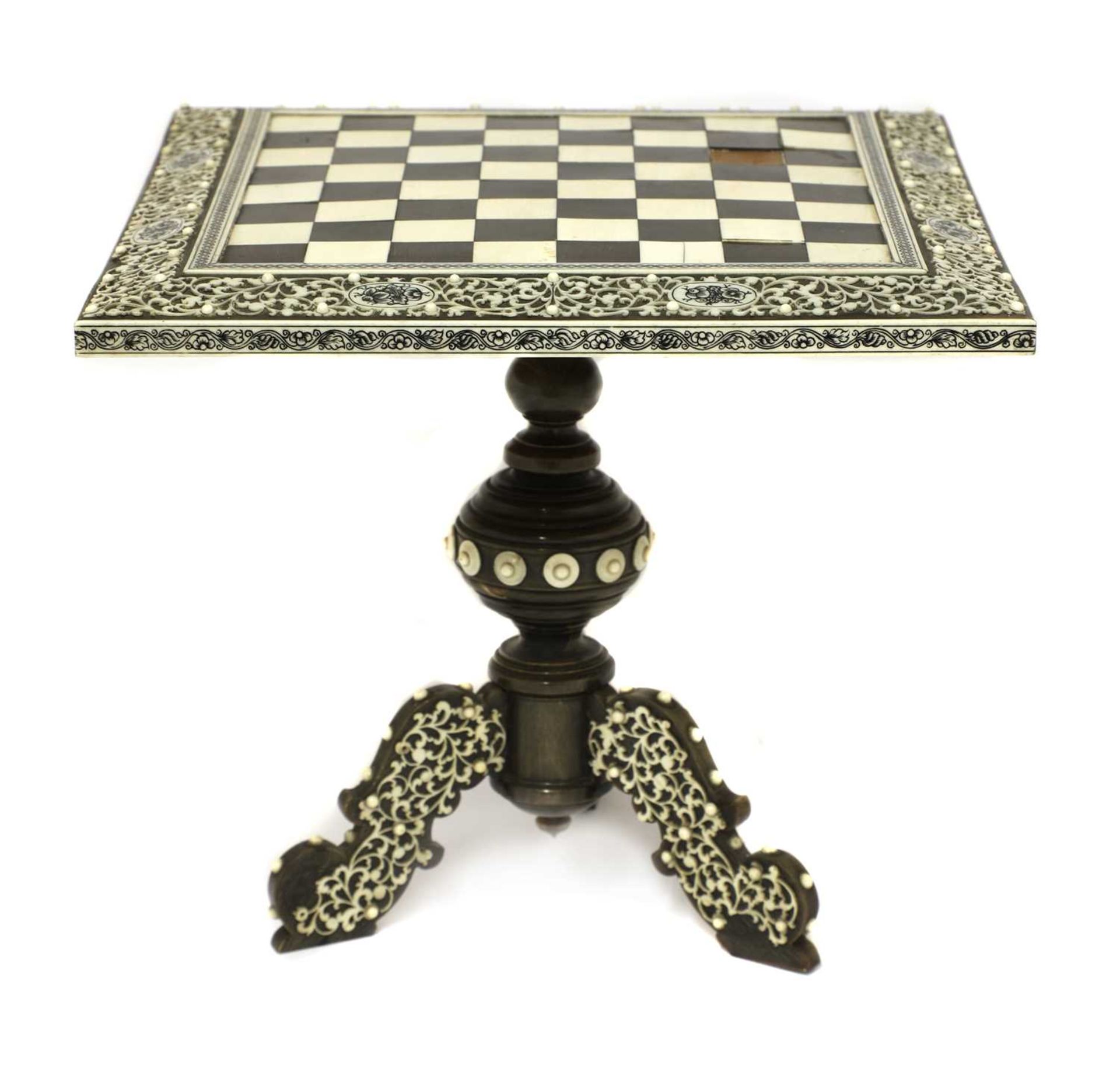 An Anglo-Indian ivory, horn and sandalwood miniature games table,