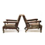 Two similar library armchairs by Gillow,