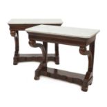 A pair of French Louis Philippe mahogany console tables,