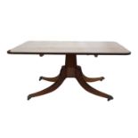 A Regency strung mahogany centre table,