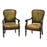 A pair of French Louis Philippe mahogany library armchairs