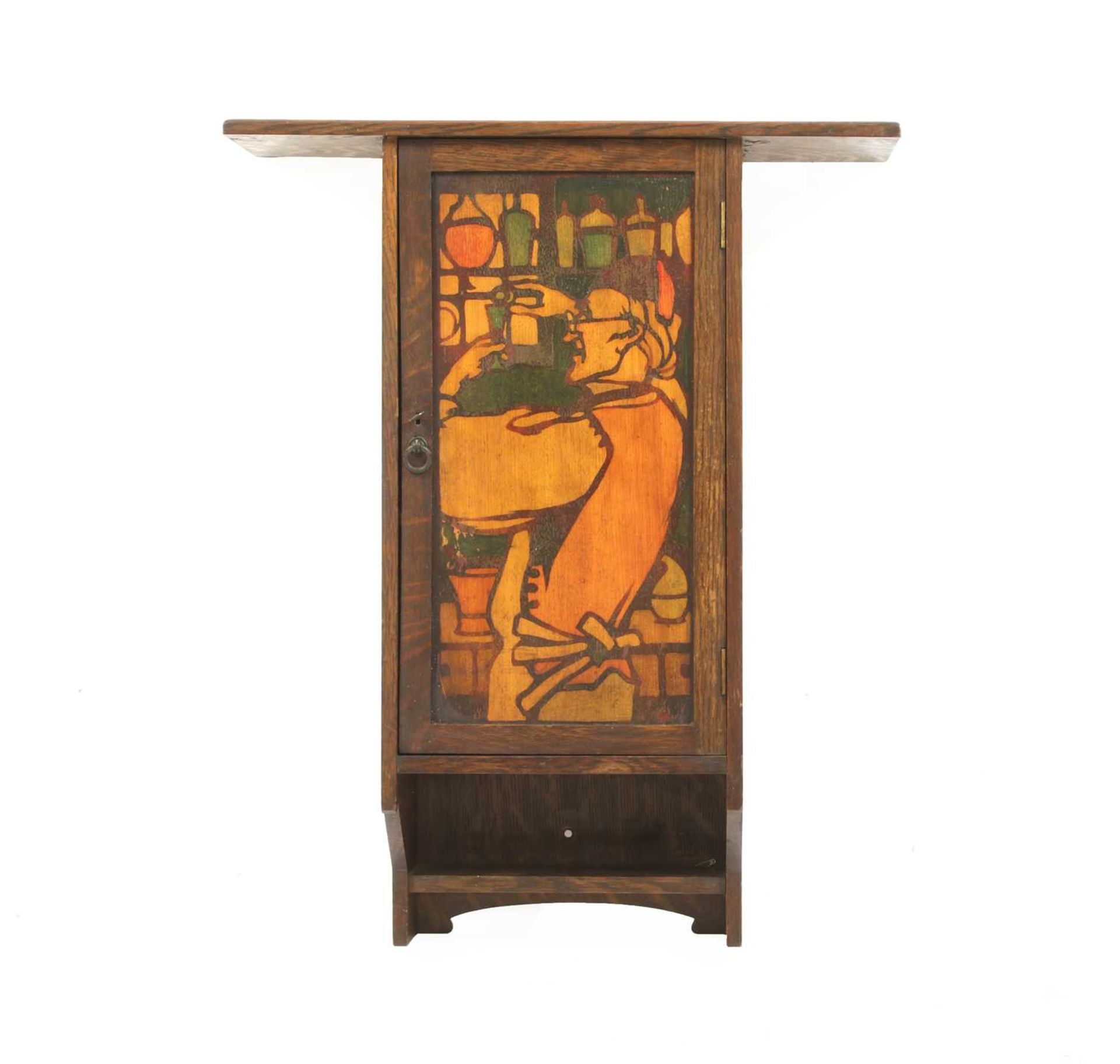 An oak wall-mounted cabinet by Liberty & Co.,