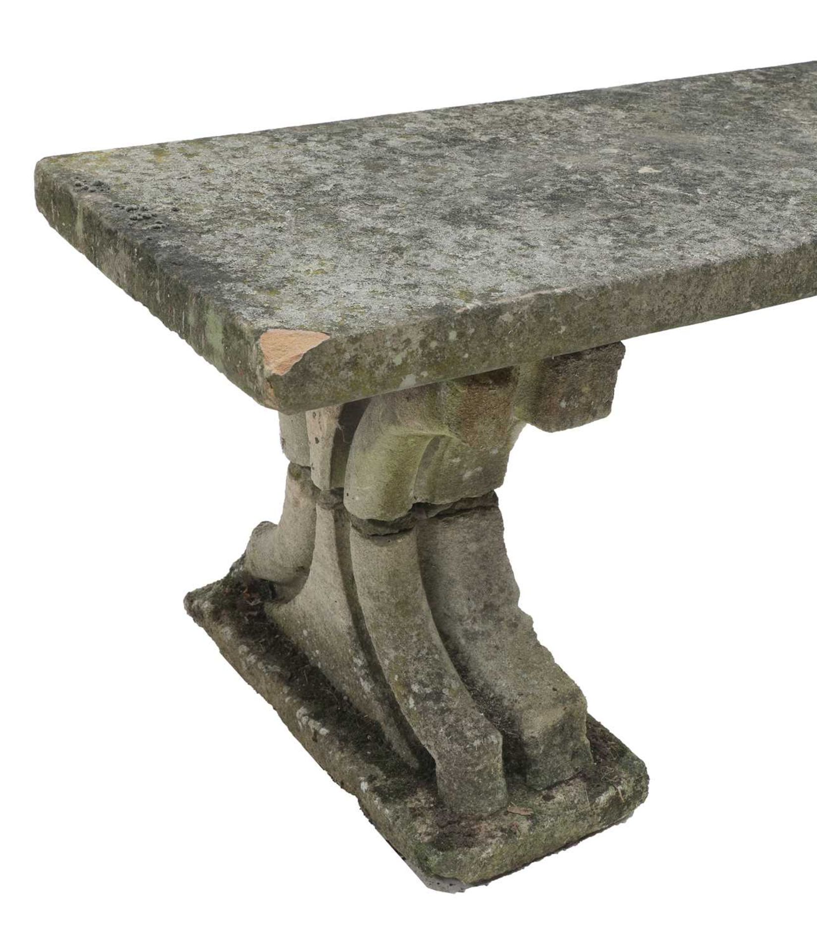 A weathered stone garden bench, - Image 2 of 4
