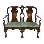 A George II-style walnut two-seater settee,