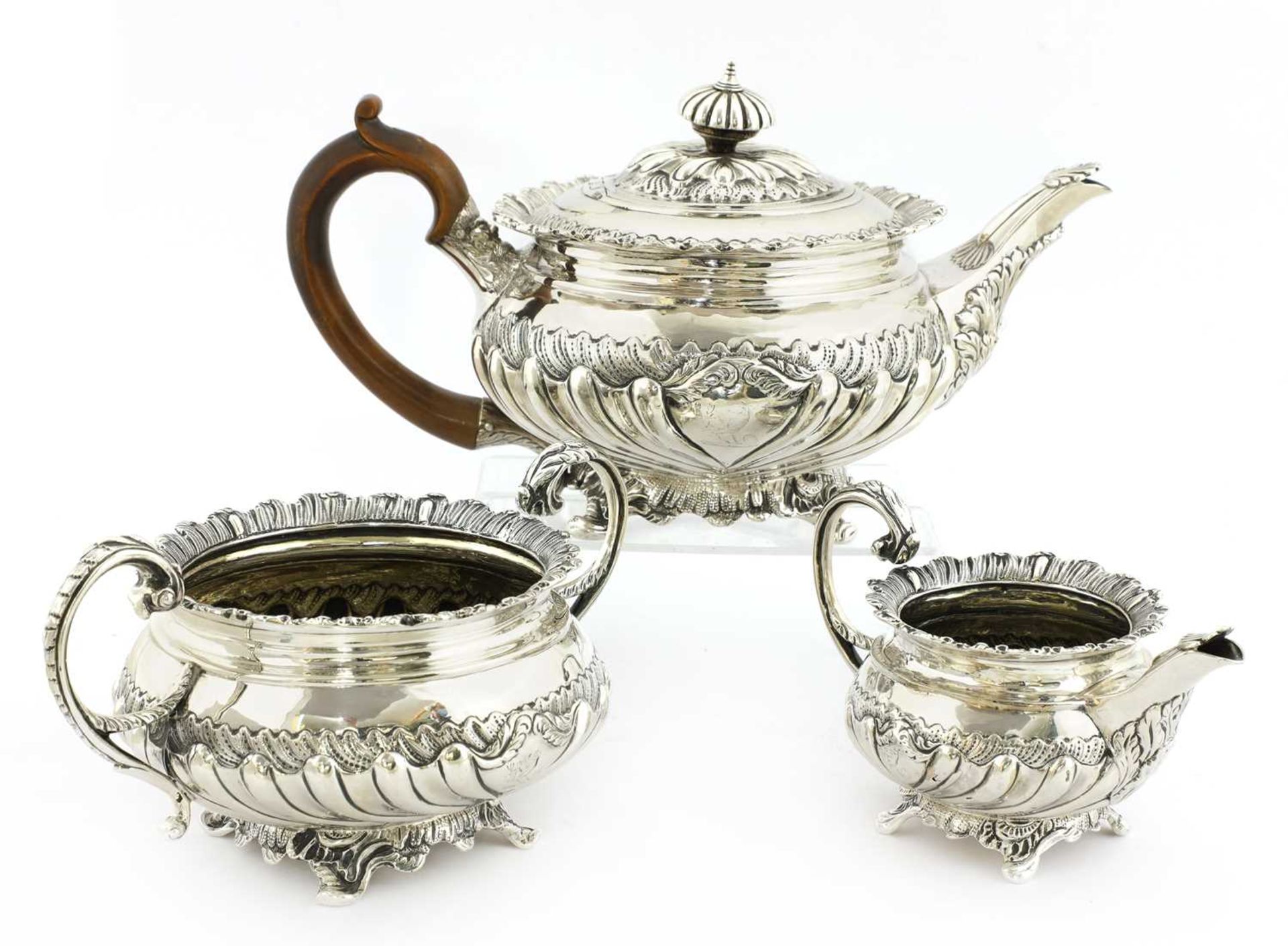 A George III silver three-piece tea service,