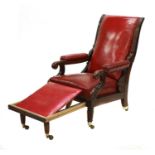 A rosewood reclining library armchair,