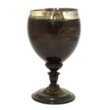 A George IV silver-mounted coconut cup,