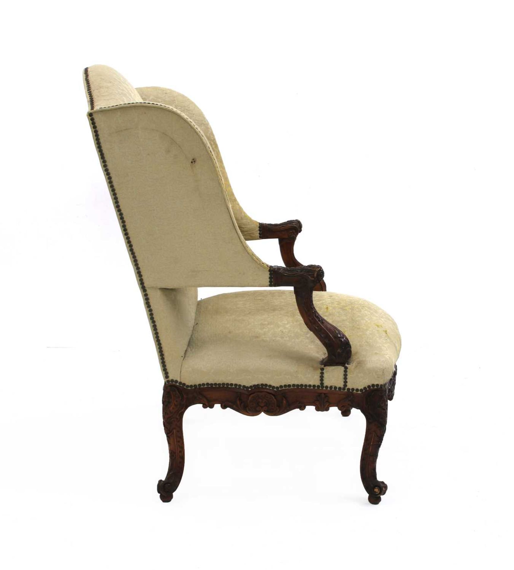 A French Régence walnut wing backed armchair, - Image 3 of 5