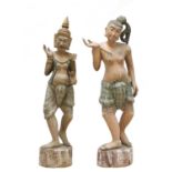 A pair of carved and painted softwood dancers,