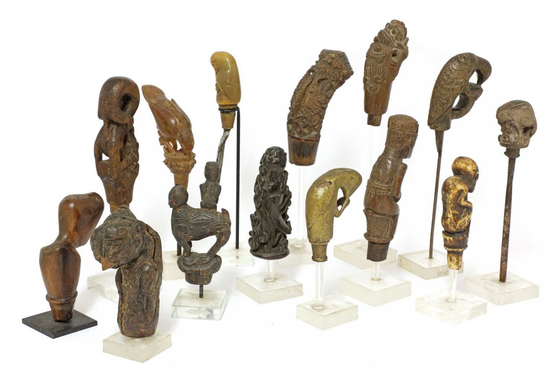 A collection of fourteen Indonesian kris hilts, - Image 2 of 19