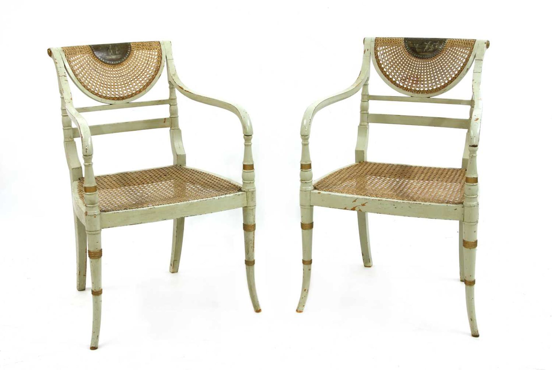 A pair of painted neoclassical salon chairs,