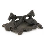 A cast iron boot scraper by Coalbrookdale,