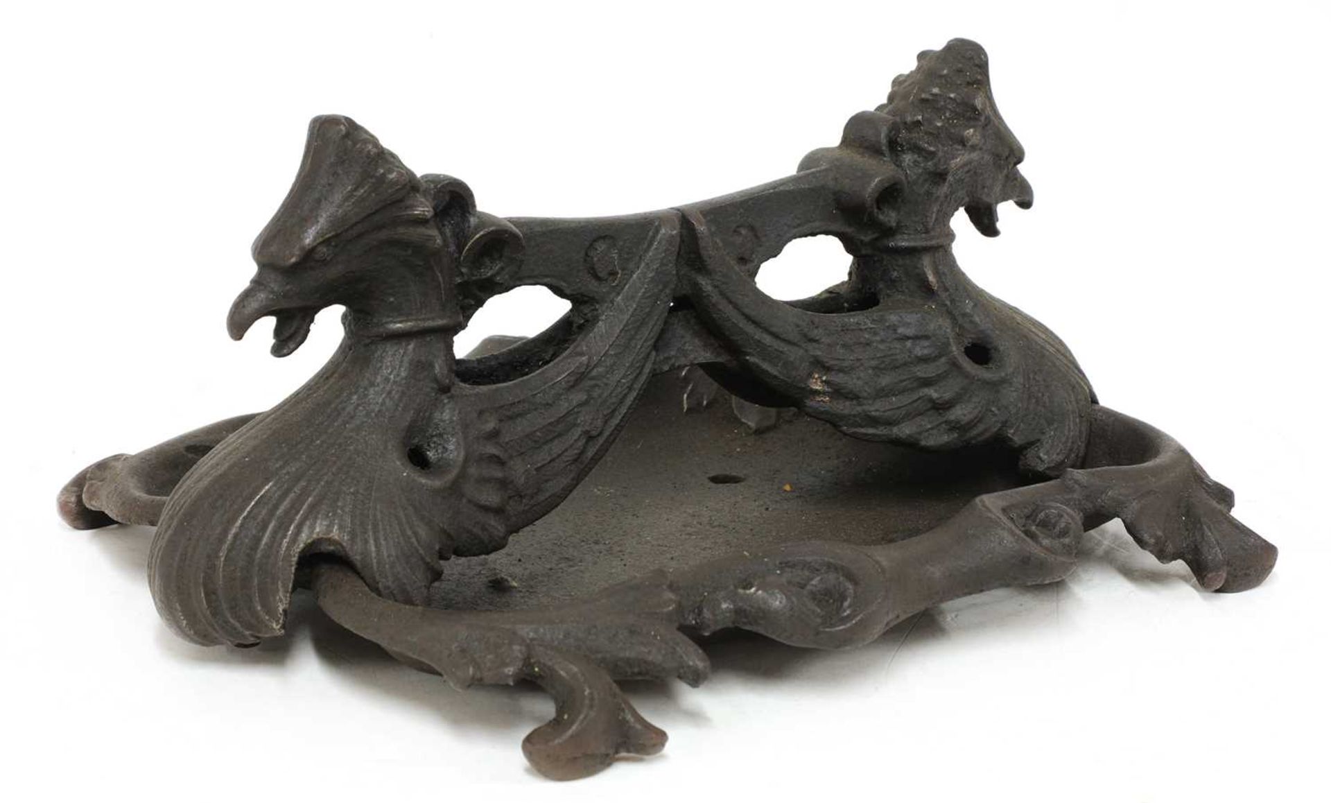 A cast iron boot scraper by Coalbrookdale,