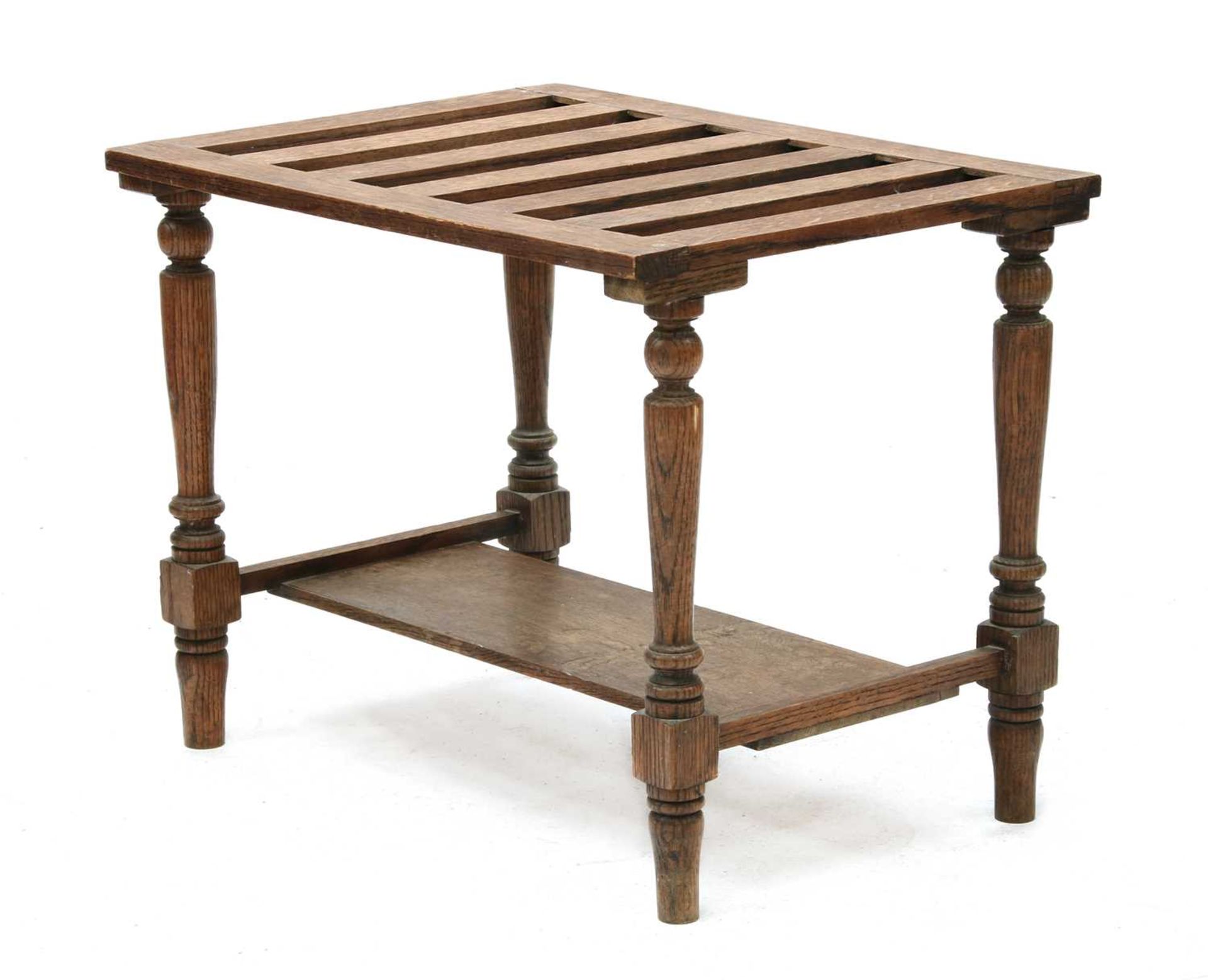 A country oak luggage stand,