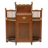 A mahogany hall stand by James Shoolbred & Co.,